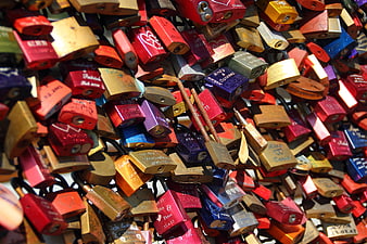Colorful Love Locks on Bridge Railing