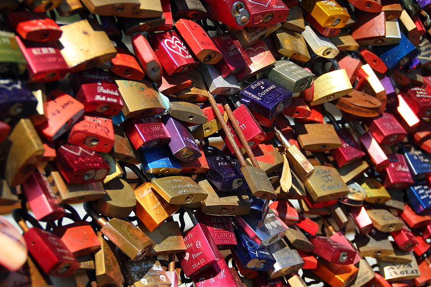 Colorful Love Locks on Bridge Railing