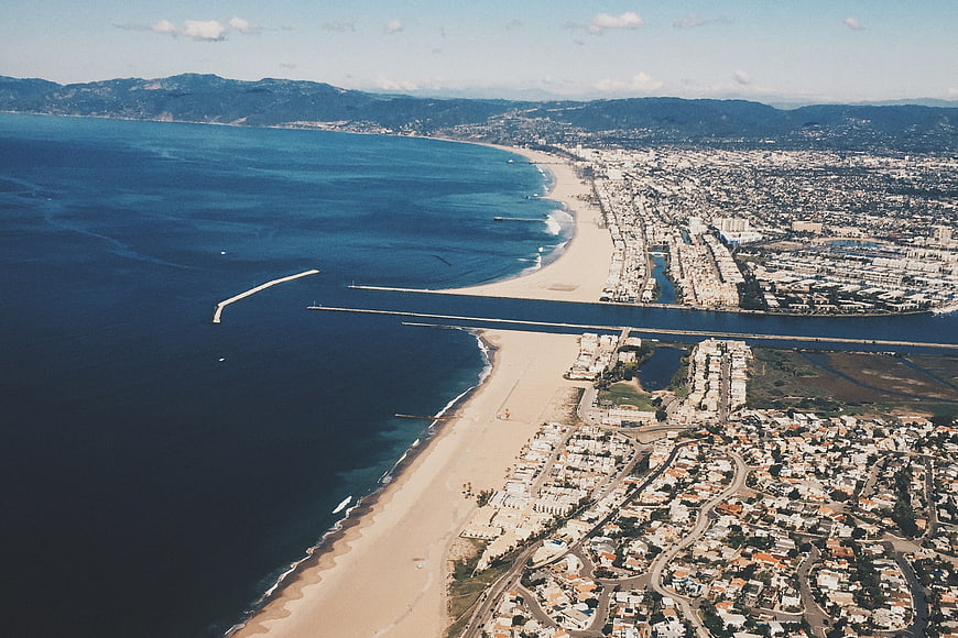 Aerial view of Marina del Rey coastline and cityscape