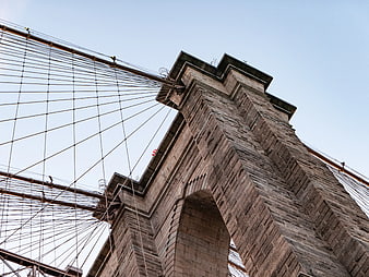 Low Angle View of Brooklyn Bridge Tower and Cables