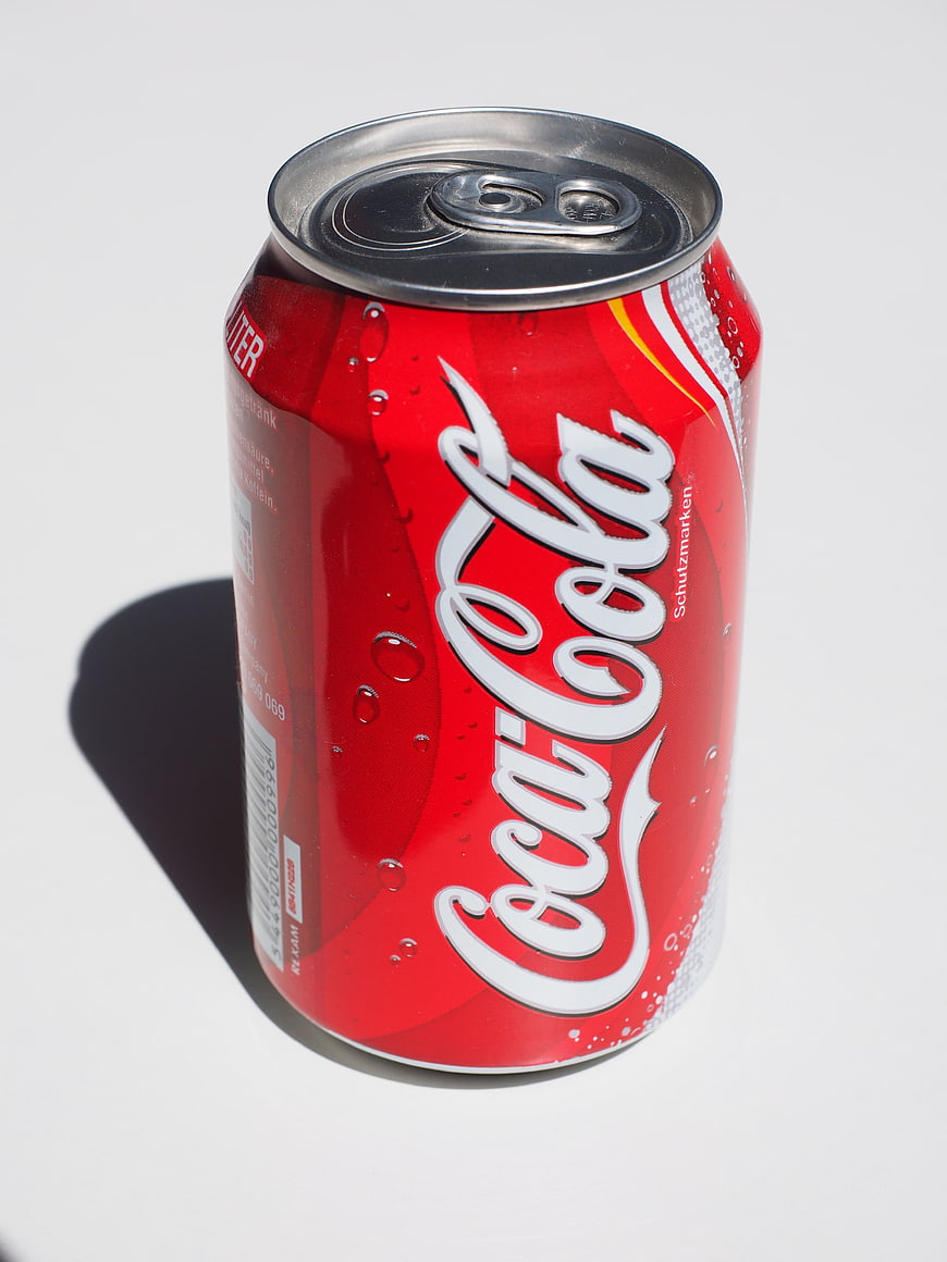 Coca-Cola Can With Water Droplets On White Background