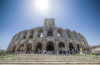 Arles Amphitheatre in France with Blue Sky