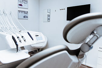 Modern Dental Clinic Interior with Equipment and Chair