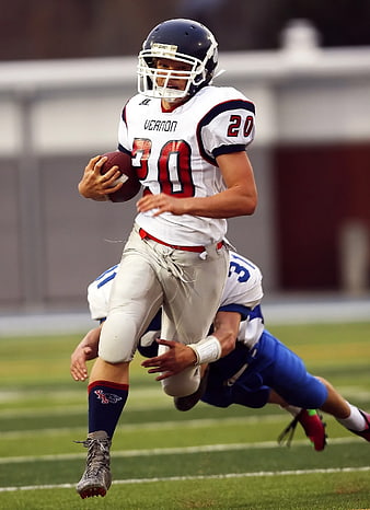 American Football Player Running with Ball During Game