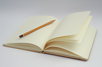 Open Blank Notebook with Pencil on White Background