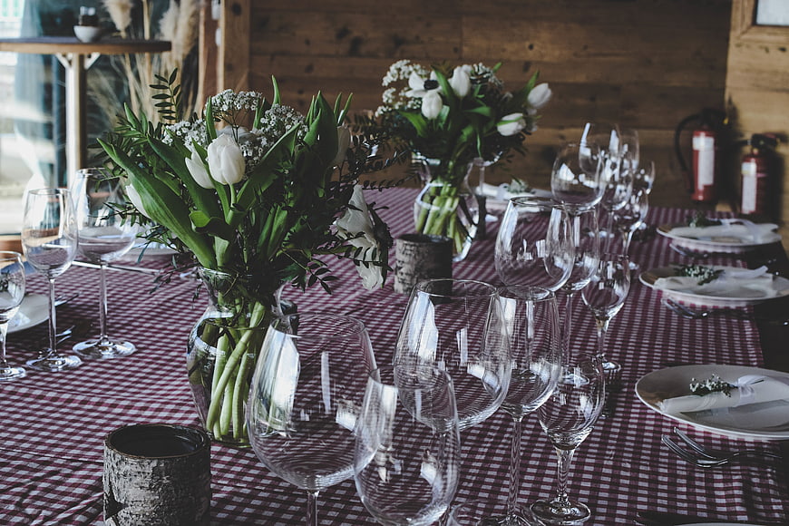 Rustic Wedding Table Setting with White Tulips and Checkered Cloth