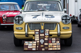 Vintage Triumph Herald Race Car with Rally Plaque