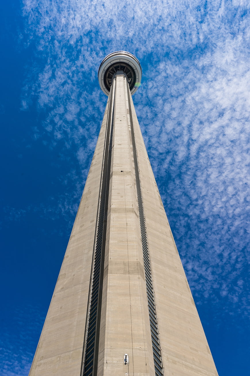 Low angle view of CN Tower against blue sky