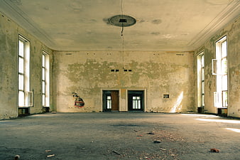 Abandoned Interior Room With Peeling Walls And Graffiti