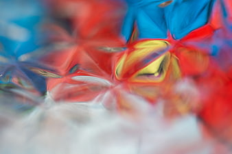 Abstract colorful blurred background with red, blue, and yellow shapes