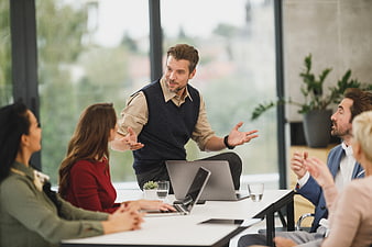 Business team meeting discussion in modern office