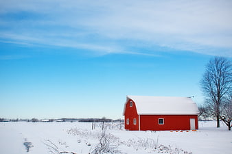 Red Barn in Snowy Winter Landscape