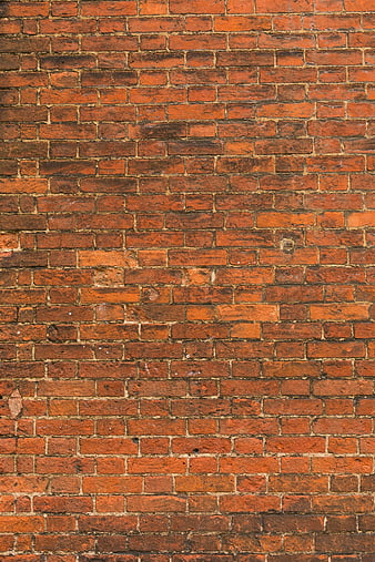 Textured Red Brick Wall Background with Weathered Grout