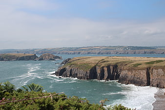 Scenic coastal cliffs and ocean waves landscape