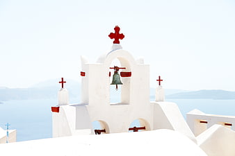 White Greek Orthodox Church Bell Tower with Red Crosses
