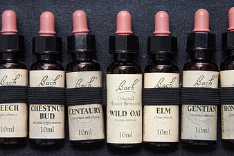 Row of Bach Flower Remedies Vials with Pink Droppers