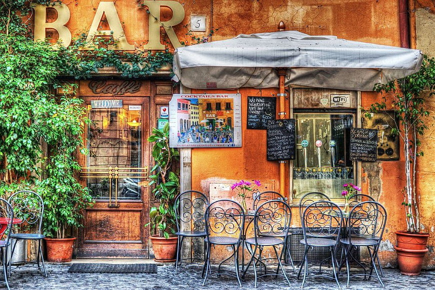 Vintage European Bar Facade with Outdoor Seating
