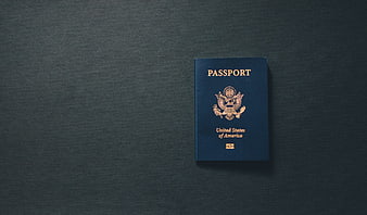 US Passport on Dark Textured Background with Copyspace