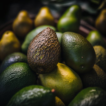 Close-up of fresh avocados with textured skin