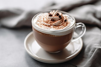 Hot chocolate with whipped cream and chocolate shavings