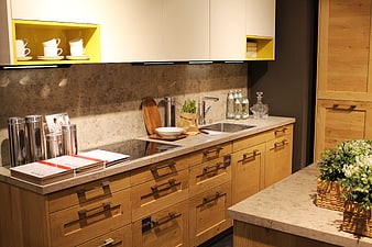 Modern Kitchen Interior With Wooden Cabinets And Yellow Accents