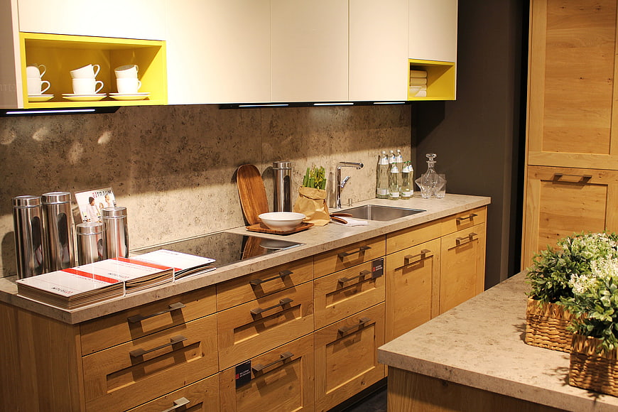 Modern Kitchen Interior With Wooden Cabinets And Yellow Accents