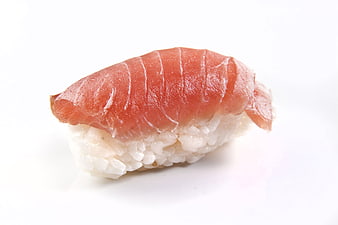 Single piece of salmon nigiri sushi on white background