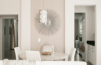 Modern Dining Room with Sunburst Mirror and Marble Table