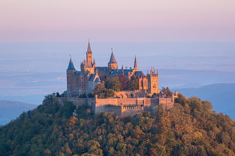 Hohenzollern Castle at Sunrise on Forested Hill