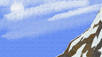 Snowy Mountain Peak Against Blue Sky with Clouds