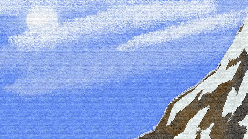 Snowy Mountain Peak Against Blue Sky with Clouds