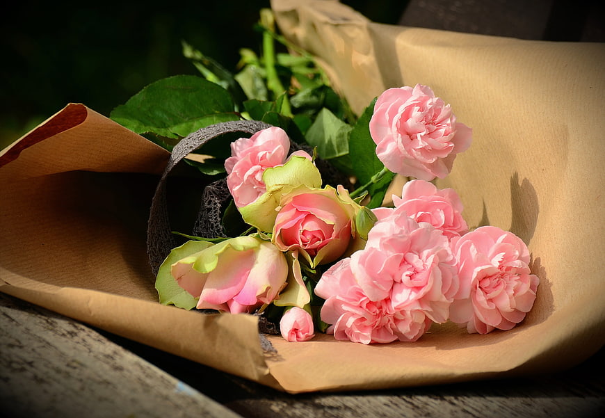 Pink Carnations and Roses Wrapped in Kraft Paper