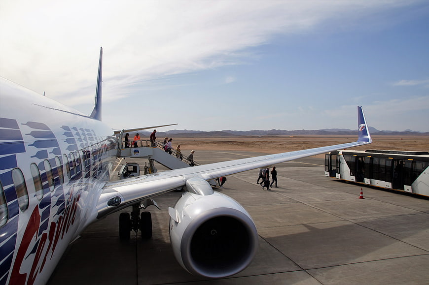 Passengers boarding Southwest Airlines plane at desert airport