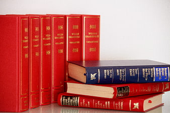 Red Shakespeare Collection And Stacked Reader's Digest Books