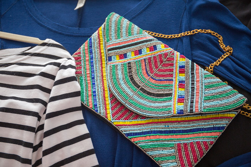 Colorful Beaded Handbag on Blue Shirt and Striped Top