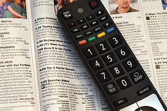 Black TV Remote Control on TV Guide Magazine