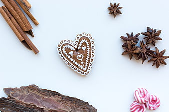 Heart-shaped gingerbread cookie with cinnamon and star anise