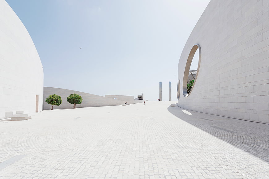 Modern White Architectural Courtyard with Circular Window
