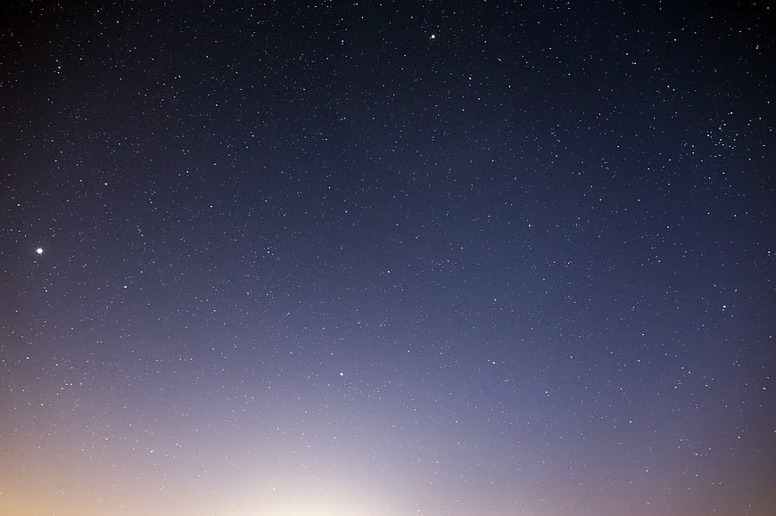 Starry Night Sky Gradient with Bright Stars