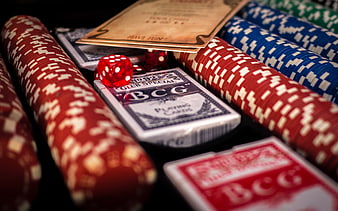 Casino Gambling Setup With Poker Chips, Cards, And Red Dice