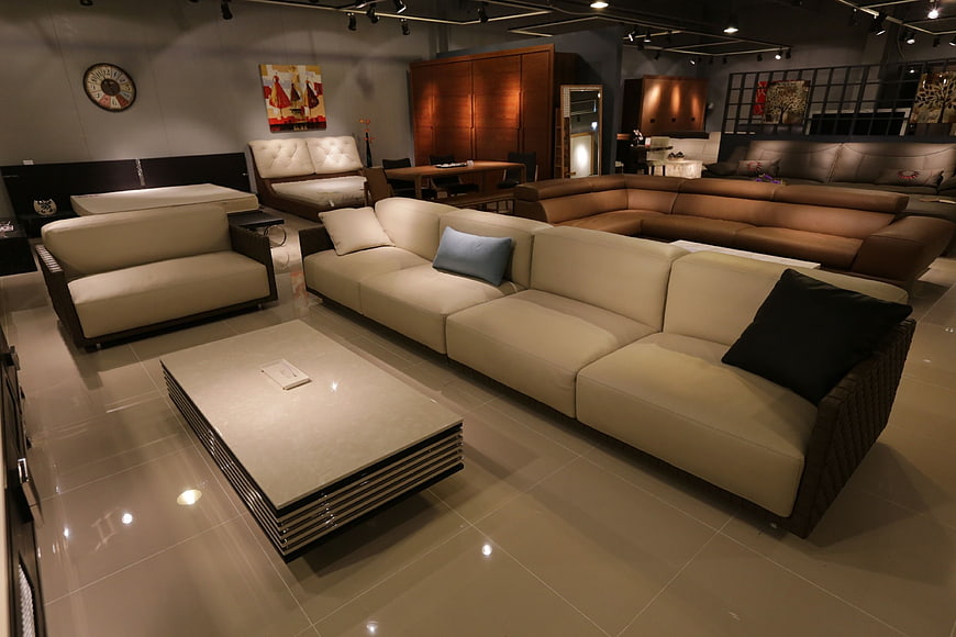 Modern beige sectional sofa in furniture showroom
