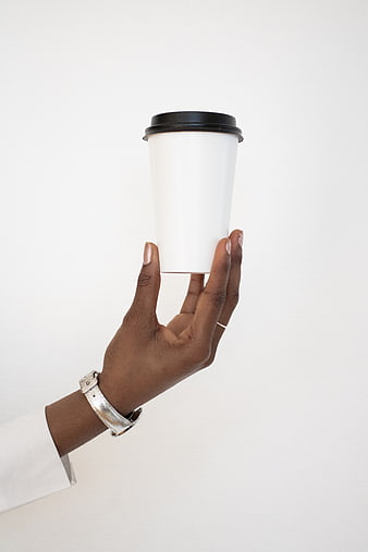 Woman's Hand Holding Blank White Coffee Cup Mockup