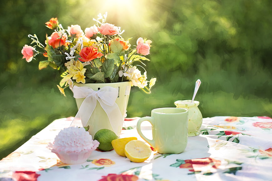 Summer Garden Picnic with Flowers, Tea, and Lemon