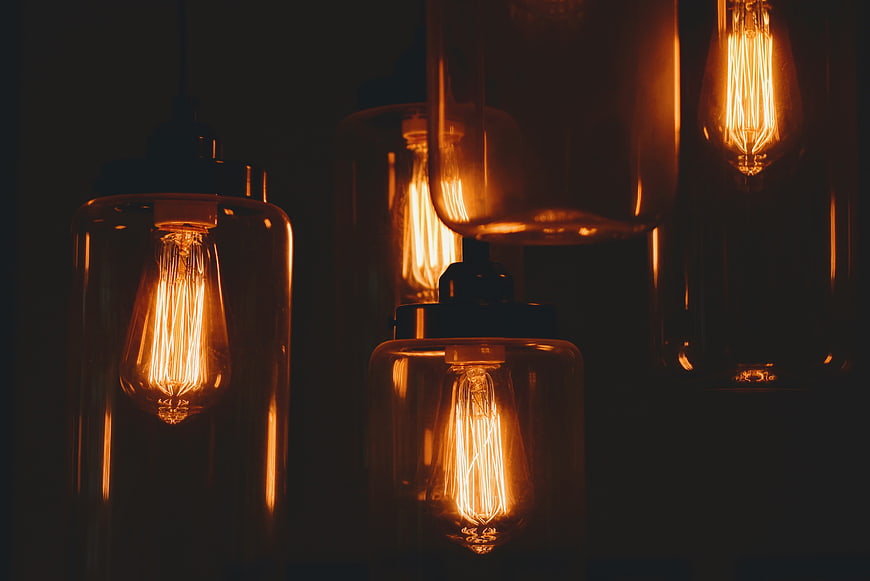 Vintage Edison Bulbs Hanging in Dark Interior
