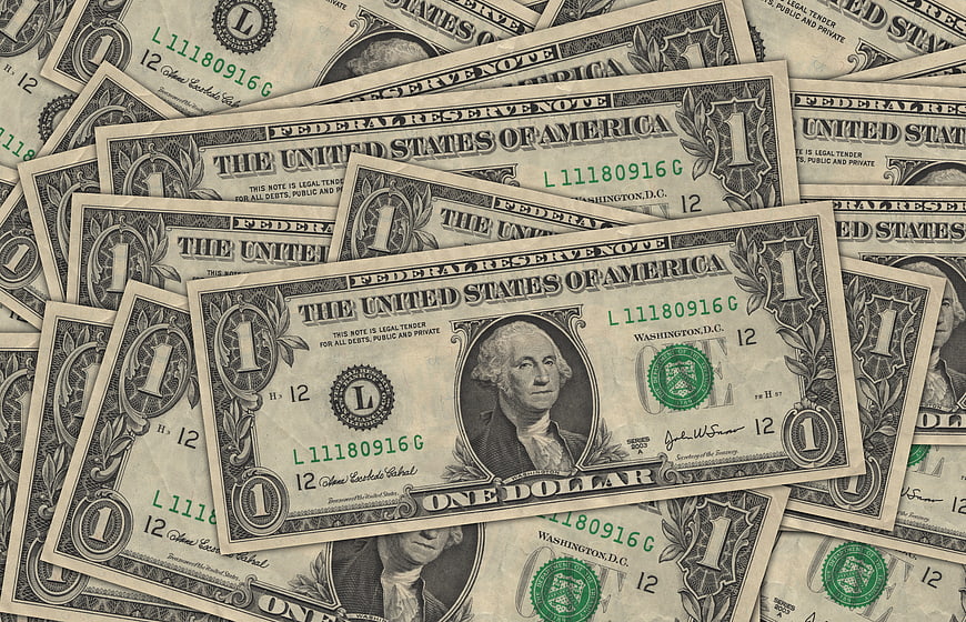 Scattered US One Dollar Bills Background