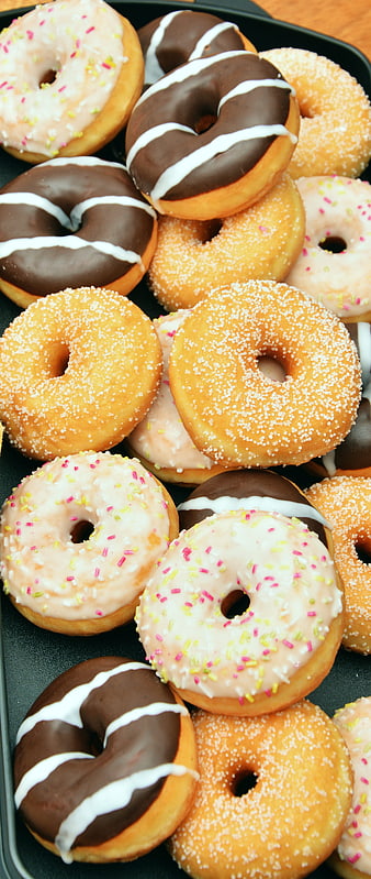 Assorted Glazed and Chocolate Donuts with Sprinkles