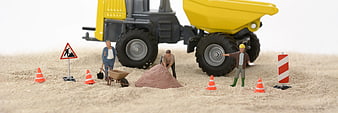 Miniature Construction Site with Workers and Dump Truck
