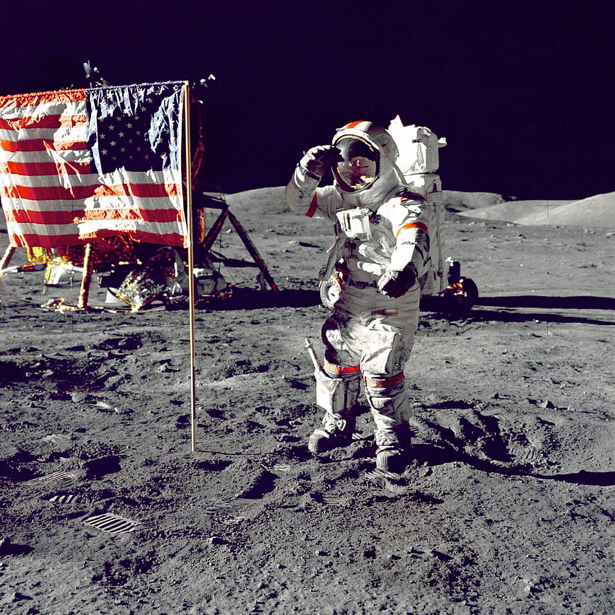 Astronaut on the Moon with American Flag and Lunar Module