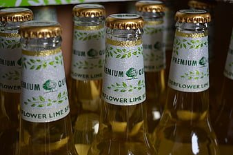 Close-up of Premium Quality Hopsflower Lime Beer Bottles