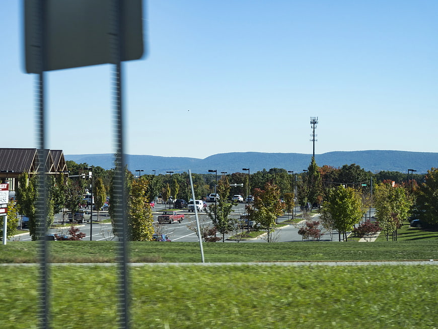 Suburban Shopping Center Parking Lot with Mountain View